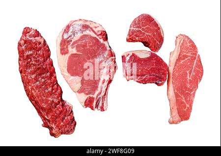 Auswahl an rohen schwarzen angus Rindfleisch Steaks Filet Mignon, Ribeye, Striploin und Rock oder Machete. Isoliert auf weißem Hintergrund. Draufsicht Stockfoto