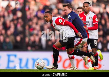 Rotterdam - Igor Paixao aus Feyenoord, Mathias Kjolo vom FC Twente während des Eredivisie-Spiels zwischen Feyenoord und FC Twente im Stadion Feijenoord de Kuip am 28. Januar 2024 in Rotterdam, Niederlande. (Box to Box Pictures/Tom Bode) Stockfoto