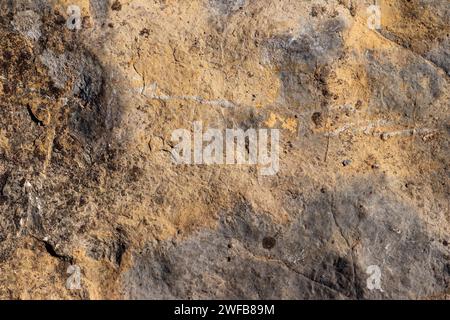 Verwitterte Oberfläche aus Sandsteingestein, natürliche Textur Stockfoto