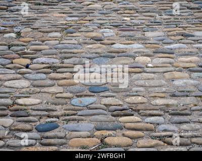 Hintergrund eines Steinpflasters. Steinwandstruktur Stockfoto