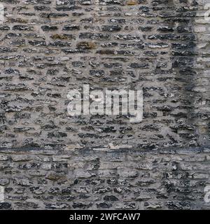 Textur einer Steinmauer. Alte Burg Stein Wand Textur Hintergrund. Stein Wand als Hintergrund oder Textur. Teil einer Mauer aus Stein, für den Hintergrund oder Text Stockfoto