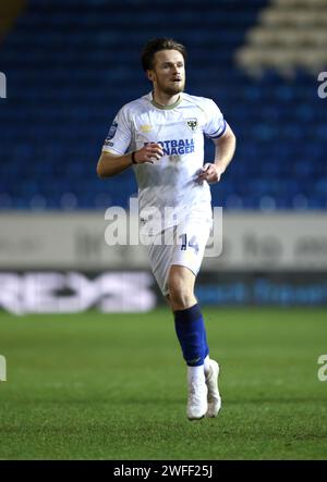 Peterborough, Großbritannien. 30. Januar 2024. Armani Little (AFCW) beim Spiel Peterborough United gegen AFC Wimbledon EFL Trophy im Weston Homes Stadium, Peterborough, Cambridgeshire, am 30. Januar 2024. Quelle: Paul Marriott/Alamy Live News Stockfoto