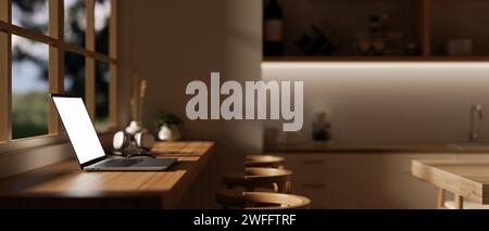 Seitenansicht eines Laptops auf einem Hartholzschreibtisch vor dem Fenster in einer modernen, gemütlichen Küche. Remote-Arbeitsplatz zu Hause. 3D-Rendering, 3D-Illustration Stockfoto