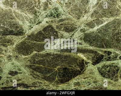 Grüner polnischer Marmor glänzende Textur Granit Platte Stein Hintergrund Stockfoto