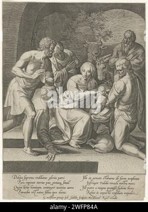 Hirtenverehrung in einer Nische, Johann Sadeler (I), nach Gillis Mostaert (I), 1560–1600 Druck in der Mitte einer Nische, Maria sitzt neben dem Christuskind in der Krippe. Hinter Maria steht Joseph und der OS und der Esel. Die Hirten knien vor dem Christkind. Der Druck hat einen lateinischen Text als Unterschrift. Unbekannter Papierstich Anbetung des Christuskindes durch die Hirten; Maria und Josef anwesend Stockfoto