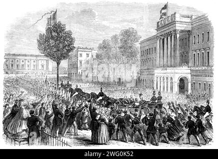 König Leopolds öffentlicher Eingang nach Brüssel&#x2026; Ankunft seiner Majestät im Palast - nach einem Entwurf von Mr. Hendrikx, 1862. "Die Bevölkerung... drängte die Straßen und Straßen, die für die königliche Route bestimmt waren... der König, obwohl etwas blass, sah bemerkenswert gut und robust aus, angesichts der Länge und der Natur seiner schmerzhaften Krankheit. Er schien manchmal fast von den liebevollen Willkommensbekundungen überwältigt zu sein, die ihn von allen Seiten begrüßten... die ganze Szene war eine von übertrefflicher Brillanz, die Häuser und Bäume waren reich mit den nationalen Farben verziert... Salvos der Artillerie und der Stockfoto