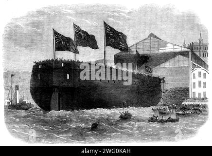 Start der panzerbeschichteten Schraubenfregatte Caledonia, 31 Geschütze, bei Woolwich, [London], 1862. "...das Schiff wurde von Miss Nicolson, der Tochter des Commodore Superintendent, benannt, mächtige Schrauben wurden am Kiel angebracht, und das edle Schiff glitt die Startwege hinunter, und schwang in die Mitte der Themse, unter dem Jubel der Zuschauer, die Bands, die "Rule Britannia" aufführten... die Caledonia wurde etwa drei Jahre lang als Holzfregatte mit 90 Kanonen, Hütte gelegt, nachdem die Admiralität den Bau solcher Schiffe aufgegeben hatte, wurde sie umgebaut und wieder Stockfoto