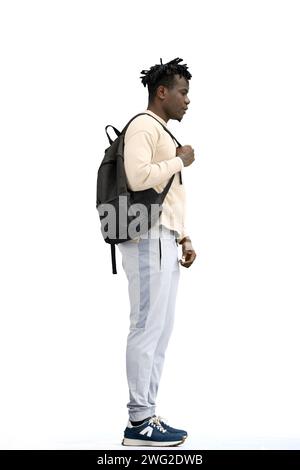 Ein Mann in voller Länge, auf weißem Hintergrund, mit Rucksack Stockfoto