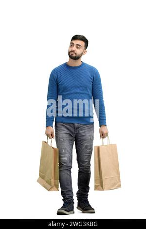 Ein Mann in voller Länge, auf weißem Hintergrund, mit Taschen Stockfoto
