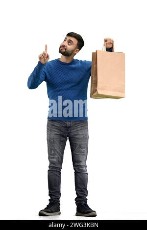 Ein Mann in voller Länge, auf weißem Hintergrund, mit Taschen Stockfoto