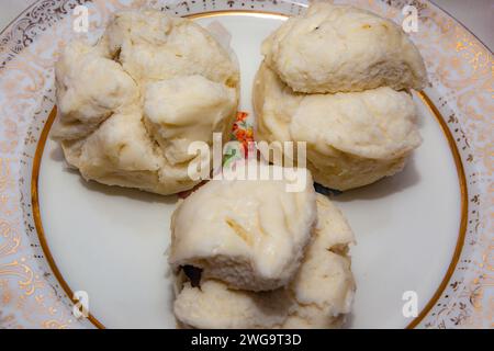 Chinesischer Schweinefleisch-Bao-Plattierung Stockfoto