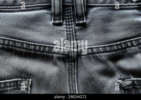 Schwarze Denim-Jeans-Textur im Nahbereich Stockfoto