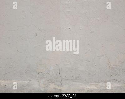 Zerrissene Zementwand-Alterung Stockfoto
