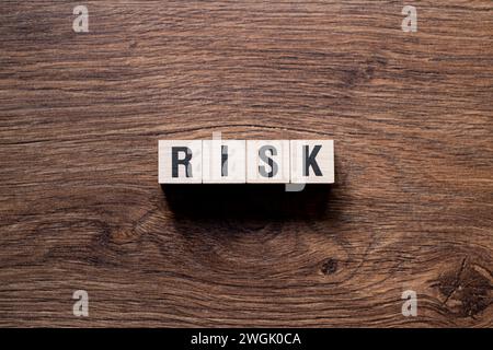 Risiko - Wortkonzept auf Bausteinen, Text Stockfoto