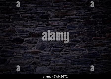 Dunkle Textur. Schwarze Nacht Stein Wand Hintergrund. Stockfoto