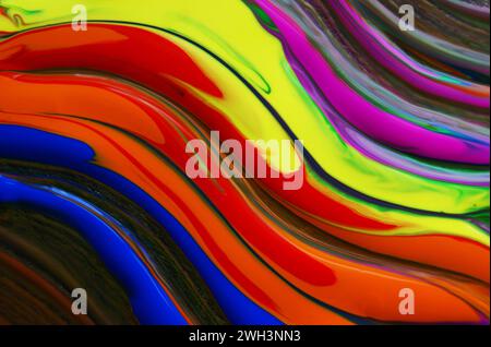 Gemusterter Hintergrund in verschiedenen fließenden Farben. Einzigartiger farbenfroher Hintergrund. Stockfoto