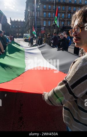 Glasgow, Schottland, Großbritannien. Februar 2024. Gewerkschafter, Studenten und Unterstützer Palästinas versammeln sich vor den Glasgower Stadtkammern als Teil eines Aktionstages, um mit Gaza zu protestieren und die Forderung der Regierung nach einem dauerhaften Waffenstillstand in Gaza zu fordern. Richard Gass/Alamy Live News Stockfoto