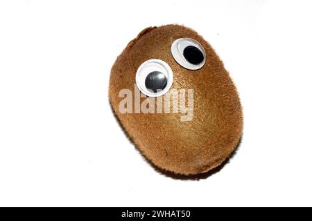 Dummes Essen mit Goggly wackeligen Augen Stockfoto