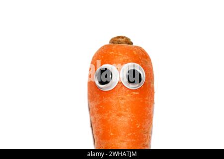 Dummes Essen mit Goggly wackeligen Augen Stockfoto