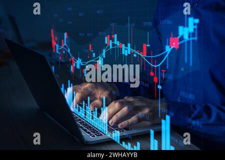 Börsen- und Handelsdaten. Investor analysiert Finanzdiagramm. Technische Analyse, Investitionen, Banken. Stockfoto