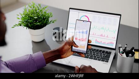 African American Data Analyst mit Data Analytics KPI Dashboard Stockfoto