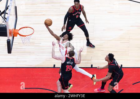 Toronto, Kanada. Februar 2024. Jalen Green (C) von Houston Rockets geht am 9. Februar 2023-2024 in Toronto, Kanada, für ein Lay-Up-Spiel zwischen Toronto Raptors und Houston Rockets 2024. Quelle: Zou Zheng/Xinhua/Alamy Live News Stockfoto