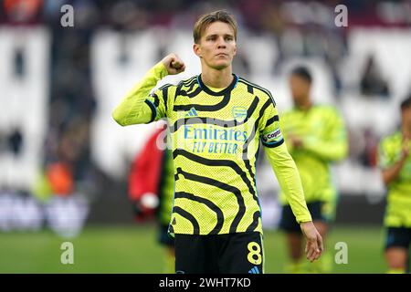 Arsenals Martin Odegaard feiert nach dem letzten Pfiff im Premier League-Spiel im London Stadium. Bilddatum: Sonntag, 11. Februar 2024. Stockfoto