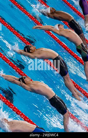 Doha, Katar. Februar 2024. Starten Sie die 3. Hitze des Schwimmens 100 m. Rückschläge bei den 21. Aquatikweltmeisterschaften im Aspire Dome in Doha (Katar), 12. Februar 2024. Quelle: Insidefoto di andrea staccioli/Alamy Live News Stockfoto