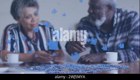 Das Bild eines Puzzles über das afroamerikanerpaar, das spricht Stockfoto