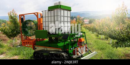 Die autonome Roboterspritze arbeitet in einem Obstgarten. Smart-Farming-Konzept. Stockfoto