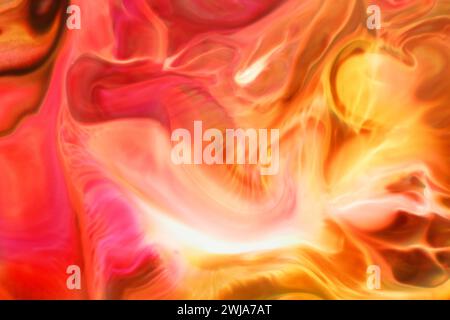 Ein lebendiges abstraktes Bild, das eine Mischung aus warmen Farben mit einer fließenden, dynamischen Textur zeigt, die ein Gefühl von Bewegung und Energie hervorruft Stockfoto