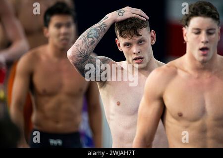 Doha, Katar. Februar 2024. Matthew Richards aus Großbritannien reagiert, nachdem er am 14. Februar 2024 im Aspire Dome in Doha (Katar) in der 50 m Freistil-Vorphase der schwimmenden Männer bei der 21. Aquatics-Weltmeisterschaft teilgenommen hatte. Quelle: Insidefoto di andrea staccioli/Alamy Live News Stockfoto