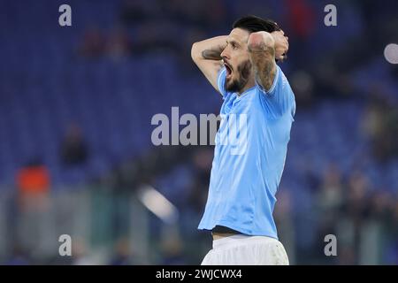 Rom, Italie. Februar 2024. Luis Alberto aus Latium reagierte während der UEFA Champions League, Achtelfinale, des 1. Leg-Fußballspiels zwischen SS Latium und Bayern München am 14. Februar 2024 im Stadio Olimpico in Rom, Italien - Foto Federico Proietti/DPPI Credit: DPPI Media/Alamy Live News Stockfoto