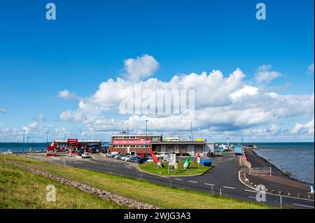 Dagebüll Fährhafen zu den inseln und Halligen an der Nordfriesischen Küste, blauer Himmel mit Wolken *** Dagebüll Fährhafen zu den Inseln und Halligen an der Nordfriesischen Küste, blauer Himmel mit Wolken Stockfoto