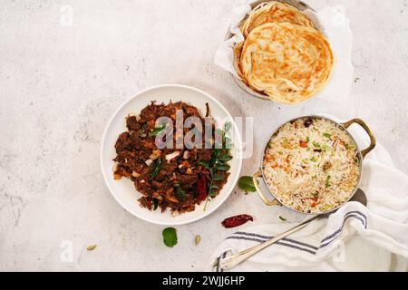 Kerala-Rinderbraten mit Parotta und Gheeireis - Malabar Iftar-fest Stockfoto