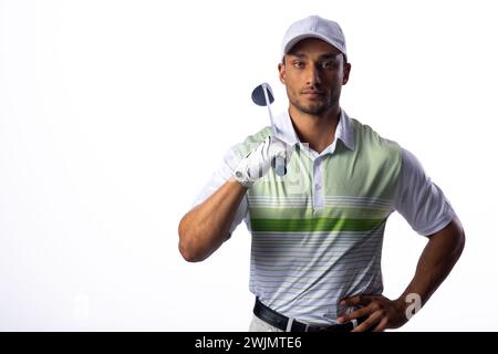 Selbstbewusster Golfspieler posiert mit einem Schläger, mit Kopierraum Stockfoto