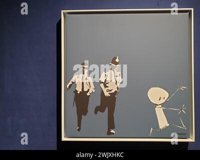 Kunstwerk „Stick Police“ von Banksy in der Ausstellung „The Mystery of Banksy – A Genius Mind“ im Technikum in Mülheim an der Ruhr am 18.11.2022 Stockfoto