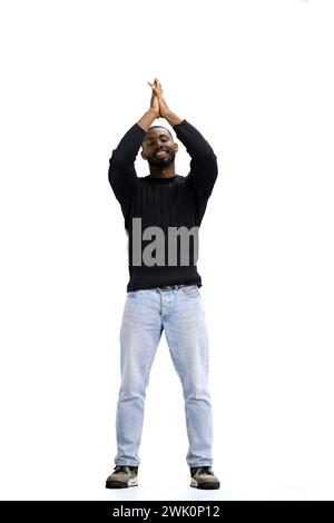 Ein Mann in voller Länge, auf weißem Hintergrund, klatscht Stockfoto