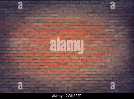 Backsteinmauerstruktur oder Backsteinmauerhintergrund. Ziegelwand für Innenausbau und Industriekonzeptdesign. Gemauerte Wandmotive Stockfoto