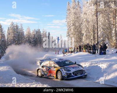 Umea, Schweden. Februar 2024. Fahrer Gregoire Munster und Beifahrer Louis Louka vom M-Sport Ford World Rally Team fahren den Ford Puma Rally1 Hybrid bei der FIA World Rally Championship 2024. Quelle: SOPA Images Limited/Alamy Live News Stockfoto