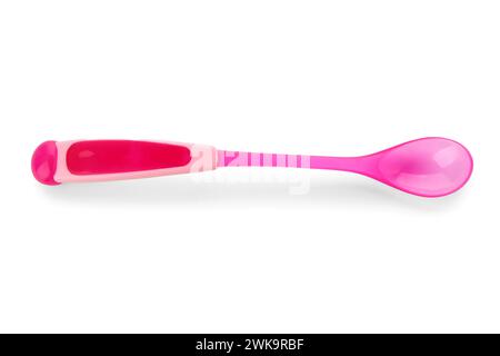 Pink plastic spoon for baby isolated on white background Stockfoto