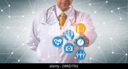 Nicht erkennbarer Arzt, der prädiktive Analysen im Netzwerk aktiviert. IT-Konzept für das Gesundheitswesen für Deep Learning, Echtzeitberichte und Analyse von Patientendaten Stockfoto