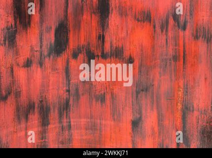 Schwarze Wand mit roten Anstrichen. Stockfoto