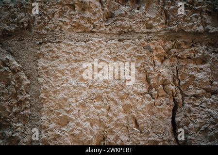 Strukturierte Steinmauer in einer mittelalterlichen Stadt Stockfoto