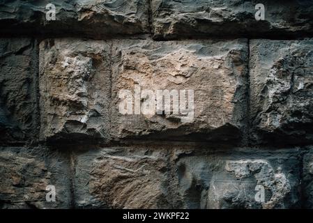 Strukturierte Steinmauer in einer mittelalterlichen Stadt Stockfoto