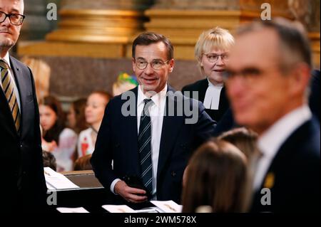 Stockholm, Schweden. Februar 2024. STOCKHOLM, SCHWEDEN 20240224Premierminister Ulf Kristersson und Ehefrau Birgitta Ed nehmen am Samstag am zweiten Jahrestag der russischen Invasion in die Ukraine an einem Friedensgebet in der Schlosskirche im Königlichen Palast Teil. Foto: Caisa Rasmussen/TT/Code 12150 Credit: TT News Agency/Alamy Live News Stockfoto