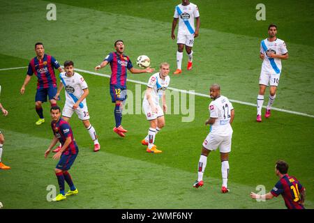 RAFINHA, BARCELONA FC, 2015: Rafinha aus Barcelona schießt ein Tor und reagiert, als er über die Bar fliegt. Das letzte Spiel der Saison 2014-15 in Spanien zwischen Barcelona FC und Deportivo de La Coruna im Camp Nou, Barcelona am 23. Mai 2015. Das Spiel endete mit 2:2. Barcelona feierte den Sieg des Meisterschaftstitels und das letzte Heimspiel von Legende Xavi. Deportiva bekam den Punkt, den sie brauchten, um Abstieg zu vermeiden. Foto: Rob Watkins Stockfoto