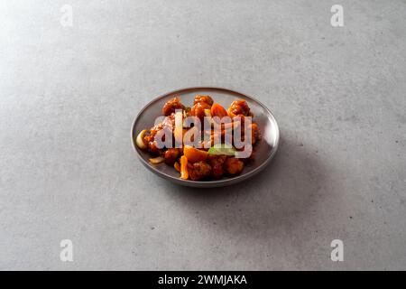 Koreanisches Gericht Ketchup Tangsuyuk, süß-saures Schweinefleisch, Guobaorou, Sojabohnenpaste Eintopf, gegrillte Schweinebacke Stockfoto