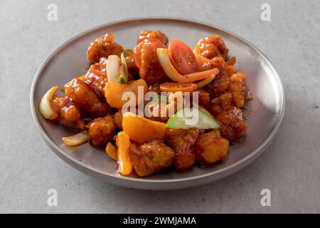 Koreanisches Gericht Ketchup Tangsuyuk, süß-saures Schweinefleisch, Guobaorou, Sojabohnenpaste Eintopf, gegrillte Schweinebacke Stockfoto