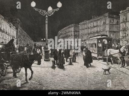 Madrid, Spanien. Die Puerta del Sol (Tor der Sonne) beleuchtet durch elektrisches Licht. Zur Feier der Hochzeit von König Alfonso XII. Mit María de las Mercedes wurde am 23. Januar 1878 die erste elektrische Beleuchtung der Stadt eingeweiht. Straßenlaternen mit Lichtbögen erleuchteten die Straße, während gleichzeitig Gasbeleuchtung in Betrieb war. Zeichnung aus dem Leben von Pellicer. Stich von Arturo Carretero (1852-1903). La Ilustración Española y Americana (die spanische und amerikanische Illustration), 1878. Stockfoto